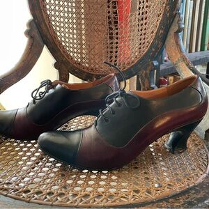 John Fluevog Black and Burgundy Lace-Up Heels